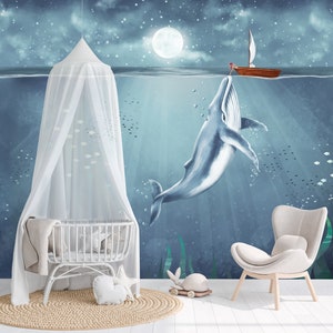 Сhildren's high quality wallpaper with a big whale and a boat for a kids room. Blue wall covering for boy or girl.