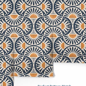 May include: Wallpaper featuring a repeating geometric pattern of dark blue semicircles and sunburst motifs in orange and cream. The design includes thin lines and dots arranged in a symmetrical layout. The text Perfect Pattern Match is visible.