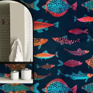 May include: Wallpaper featuring a repeating pattern of various fish in vibrant shades of orange, pink, and turquoise set against a dark navy blue background. The fish display diverse shapes and scale textures, creating a dense, colourful aquatic motif.