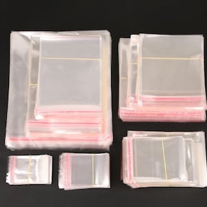 2 OOPCS sacs en plastique transparents auto-adhésifs transparents refermables en cellophane OPP emballage sacs en polyéthylène présentoir à bijoux sac d'emballage cadeaux