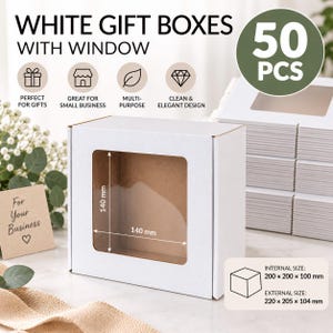 May include: A set of 50 white gift boxes with a clear window. The box features a square cutout measuring 140 mm by 140 mm. The internal dimensions are 200 x 200 x 100 mm, and the external dimensions are 220 x 205 x 104 mm. Text reads WHITE GIFT BOXES WITH WINDOW.