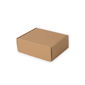 May include: A closed, rectangular cardboard box in a natural brown color. The box has a simple, folded design with visible seams and a flat top. The box is likely used for shipping or storage.