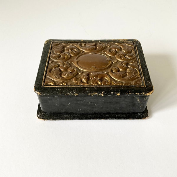 Antique French jewellery box with silk and velvet lining. Repoussé box