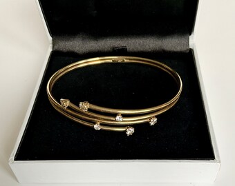 9 ct yellow gold bracelet. Italian gold bracelet. Gold Double Tube Crossover Cubic Zirconia bangle