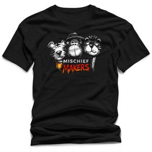 May include: Black t-shirt with a graphic of three cartoon animal faces: a tiger, a monkey, and a lion wearing sunglasses. The text "MISCHIEF MAKERS" is printed below the faces in a distressed style, with orange and red accents.