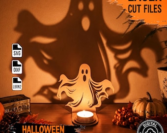 May include: A laser-cut wooden ghost tealight holder that casts a large, detailed shadow of a ghost on the wall behind it. The product includes digital files labeled SVG, DXF, and LBRN2. Text on the image reads LASER CUT FILES and HALLOWEEN TEALIGHT HOLDER.