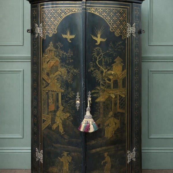 George III chinoiserie lacquered and gilt decorated bowfront double door hanging cupboard