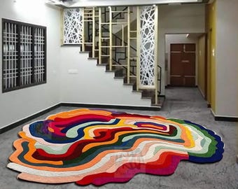 Tapete de lã tufada à mão: design de quebra-cabeça abstrato psicodélico