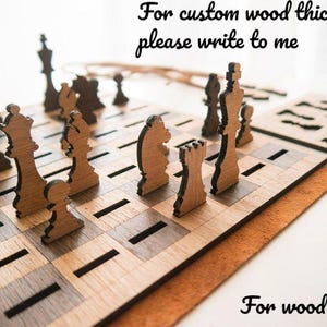 May include: A wooden chess set with a brown and black checkered board and wooden chess pieces. The board is 3mm thick. The text "For custom wood thickness please write to me" is written above the board. The text "For wood 3mm" is written below the board.