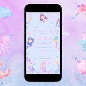May include: A smartphone displays a mermaid-themed birthday invitation with the text "EMMA is turning 3!" surrounded by watercolor illustrations of sea creatures. The background is a soft purple and blue gradient.