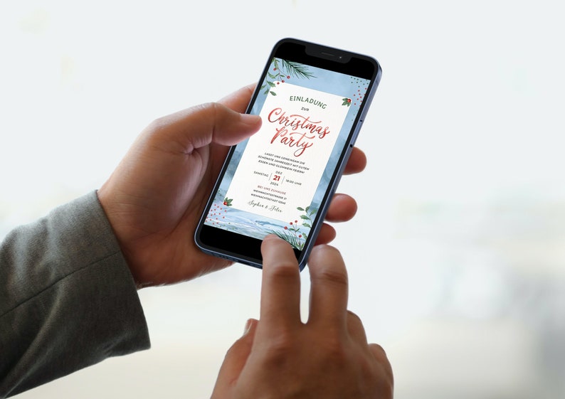 May include: A smartphone displaying a digital Christmas party invitation with a watercolor background featuring pine branches and red berries. The invitation reads "Einladung 2018 Christmas Party".