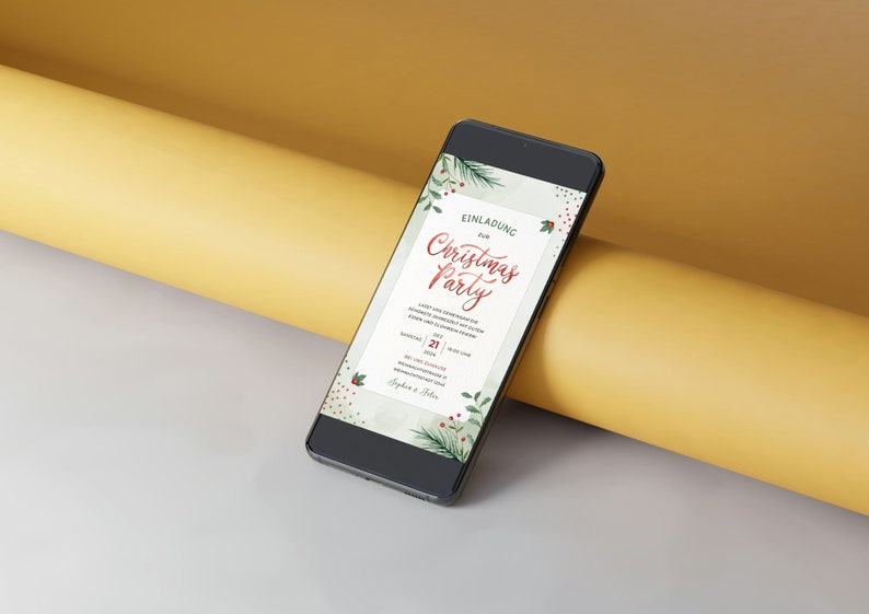 May include: A smartphone displaying a Christmas party invitation with a green and red watercolor design. The invitation reads "Einladung zur Christmas Party" and includes the date "21.12.2023".