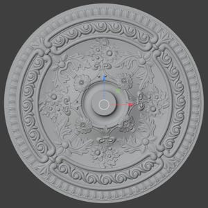 May include: A grey, circular ceiling medallion with detailed floral and scrollwork patterns. The centre has a recessed circle, and the outer edge features an ornate border. The design is symmetrical and decorative, suitable for interior design.
