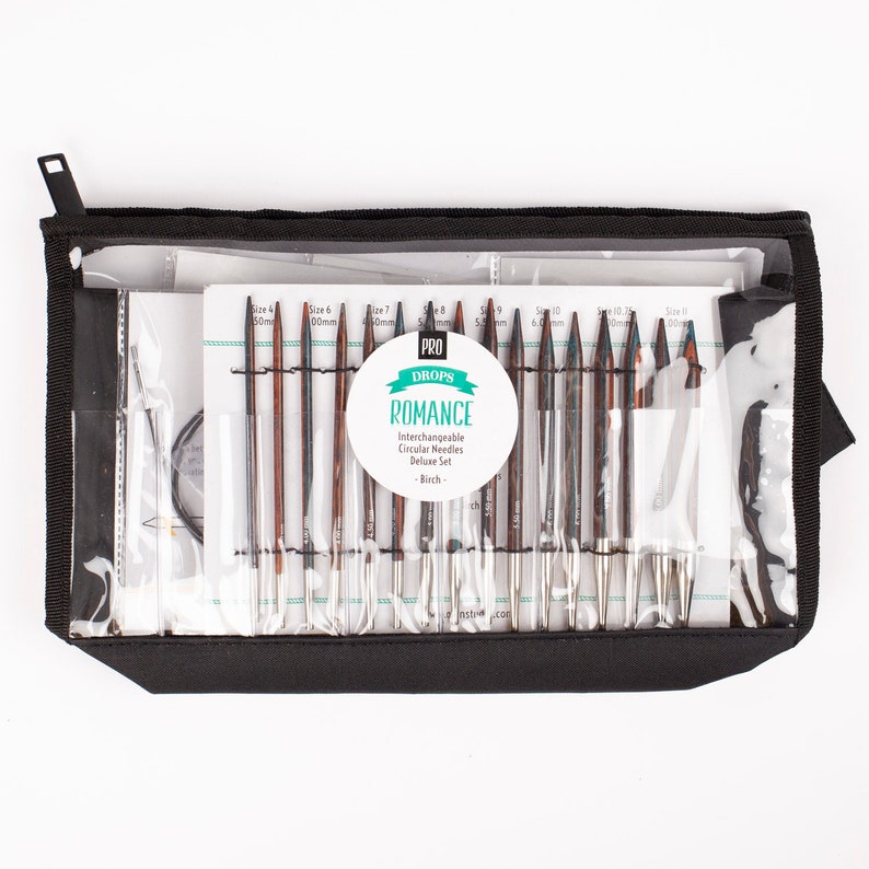 May include: A set of interchangeable circular knitting needles in a black zippered case. The needles are made of birch wood and have a silver metal tip. The set includes sizes 4 (5.0 mm), 6 (4.0 mm), 7 (3.5 mm), 8 (3.0 mm), 9 (3.25 mm), 10 (2.5 mm), 10.25 (2.25 mm), and 11 (3.75 mm). The case also includes a set of cable cords.