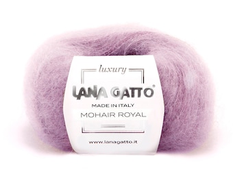 May include: A skein of soft, light purple mohair yarn with a white label that reads "luxury", "LANA GATTO", "MADE IN ITALY", "MOHAIR ROYAL", and "www.lanagatto.it".