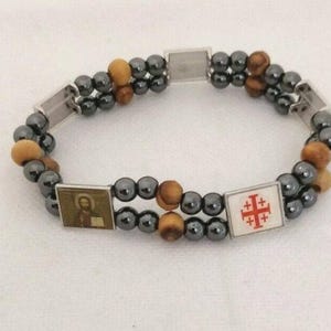 New Hematite stone and olive wood carvings with icons elastic bracelet from Bethlehem, The Holy Land