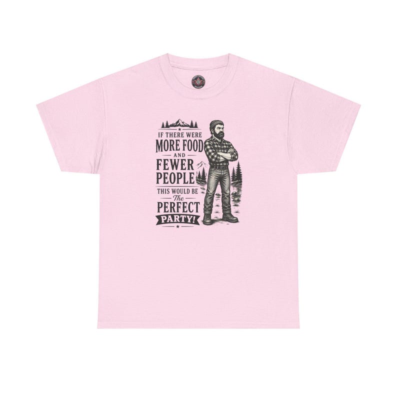 A light pink t-shirt featuring a graphic of a bearded lumberjack in a flannel shirt with the text IF THERE WERE MORE FOOD AND FEWER PEOPLE THIS WOULD BE The PERFECT PARTY!.