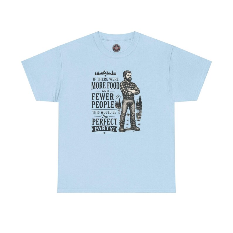 A light blue t-shirt featuring a graphic of a bearded lumberjack in a flannel shirt with the text IF THERE WERE MORE FOOD AND FEWER PEOPLE THIS WOULD BE The PERFECT PARTY!.