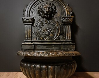 Ancient Cast Iron Wall Fountain, an authentic work of art from the 20th century