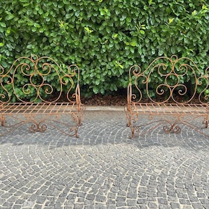 Pair of wrought iron benches