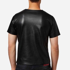 Handgjord t-shirt i fårskinnsläder: Astro Boy-konst, designerstil bild 9
