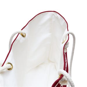 MAHJ Weekender Bag 24"x 13" in BURGUNDY and white is handy for toting the whole Mahjong game. It matches our most popular tile storage pouch image 3