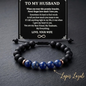 May include: Black beaded bracelet with blue lapis lazuli stones and rose gold accents. The bracelet is accompanied by a card that reads "TO MY HUSBAND" and includes a message from "LOVE, YOUR WIFE."
