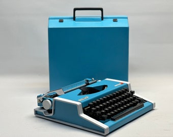 Rare 1955 Olympia Traveller Typewriter: Striking Blue, Restored Antique