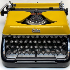 Erika Black Typewriter, 1955 Model with Yellow Cover and Details - Perfect Gift, Case Not Included