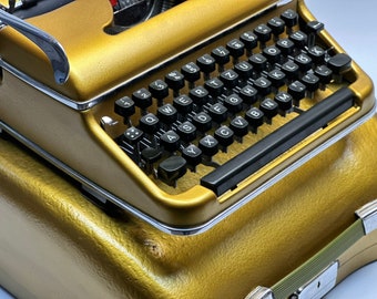 ゴールド オリンピア SM3/SM4 タイプライター：1955年製ヴィンテージ
