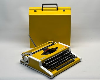 ¡RARO! Máquina de escribir Olympia Traveller - Máquina de escribir antigua - Edición vintage de 1955 en amarillo radiante