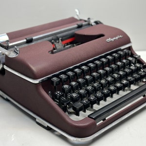 Olympia SM3 Typewriter - Bordeaux Color, Black Keys, Flawless Typing, Dual-Color Capability, Wooden Carrying Case