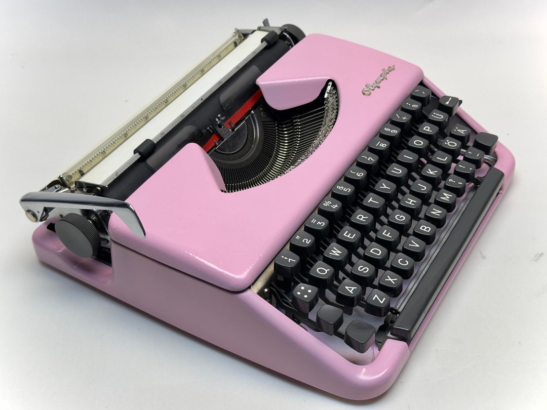 オリンピア スプレンディッド 33/66 タイプライター：ピンクのQWERTY