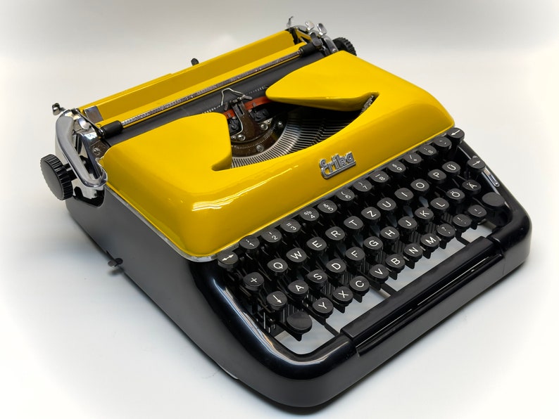 Erika Black Typewriter, 1955 Model with Yellow Cover and Details - Perfect Gift, Case Not Included