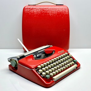 Olympia Splendid 33/66 Typewriter, Red Elegance with Matching Bag and White Keyboard - Vintage Charm from the 1960s