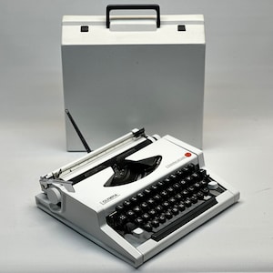 RARE! Olympia Traveller Typewriter - Antique Typewriter,Olympia Traveller Typewriter - Vintage 1965 Edition in White with Standard White Bag