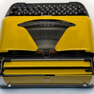 Erika Black Typewriter, 1955 Model with Yellow Cover and Details - Perfect Gift, Case Not Included