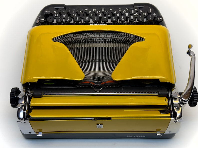 Erika Black Typewriter, 1955 Model with Yellow Cover and Details - Perfect Gift, Case Not Included