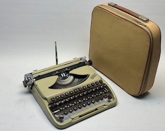 Junior Brillant Typewriter: Collectible Antique Portable Writing Machine