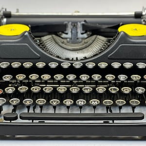 Vintage 1945 Continental Typewriter: Black with Glass Keys, QWERTZ Layout