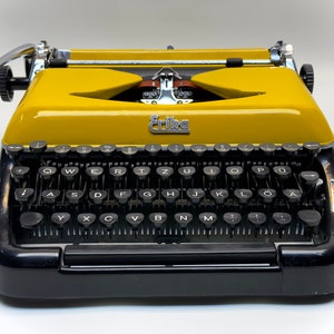 Erika Black Typewriter, 1955 Model with Yellow Cover and Details - Perfect Gift, Case Not Included