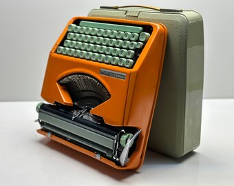 Swedish Craftsmanship: Orange Hermes Typewriter - Azerty Keyboard