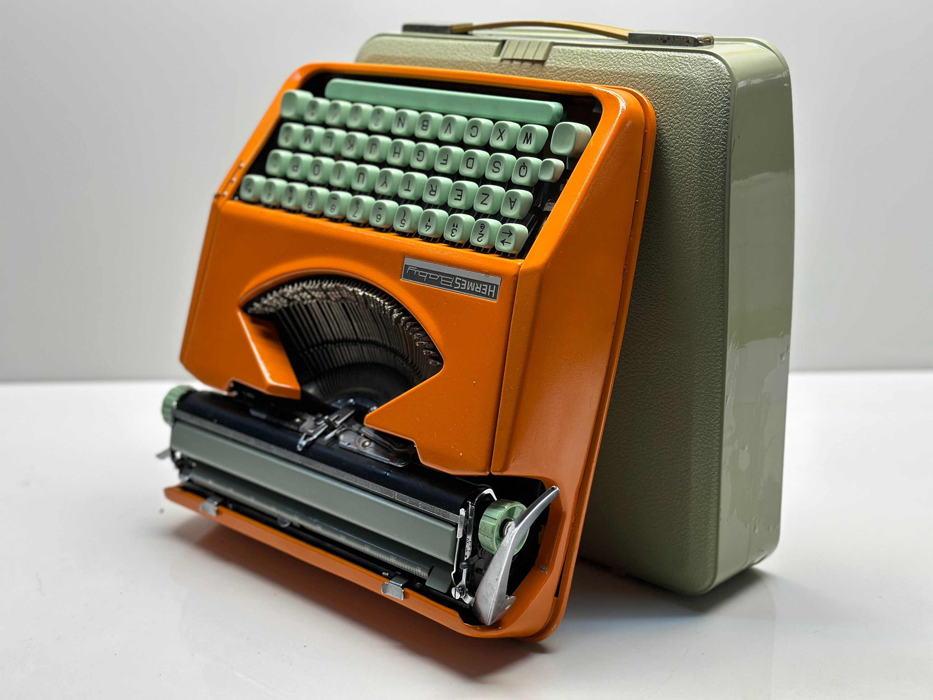 Swedish Craftsmanship: Orange Hermes Typewriter - Azerty Keyboard
