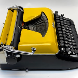 Erika Black Typewriter, 1955 Model with Yellow Cover and Details - Perfect Gift, Case Not Included