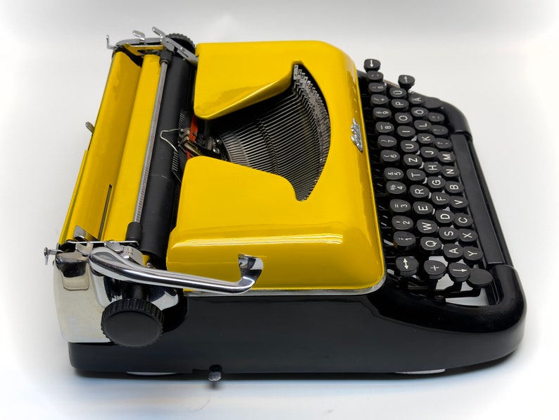 Erika Black Typewriter, 1955 Model with Yellow Cover and Details - Perfect Gift, Case Not Included