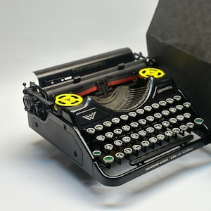 1935 Continental Typewriter with Glass Keyboard & Black Wooden Bag