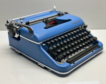 Olympia SM3 Typewriter: Vintage Blue Type Machine with Case