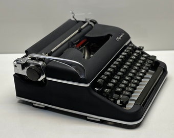 Rare! Olympia SM3 Typewriter - Vintage 1955 Edition in Classic Black - Premium Quality, Highly Preferred Model. Black Typewriter