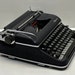 see more listings in the OLYMPIA TYPEWRITER section