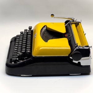 Erika Black Typewriter, 1955 Model with Yellow Cover and Details - Perfect Gift, Case Not Included